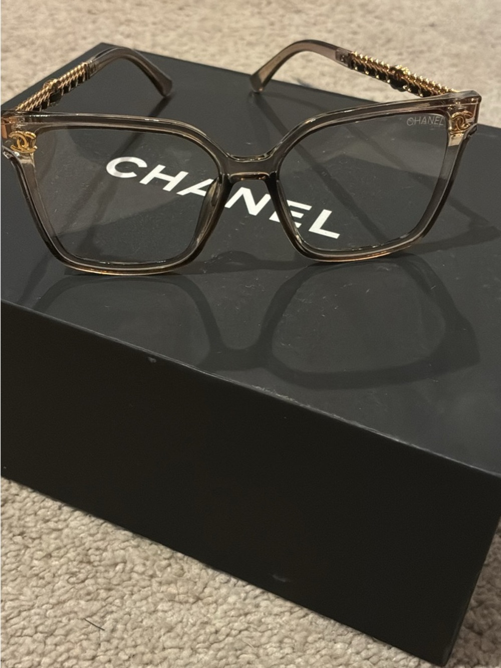 CHANEL Transparent Brown Oversized Square Glasses with Gold Chain Temples